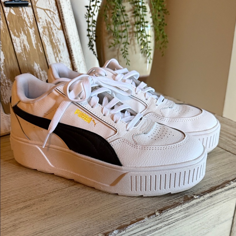 Puma White Sneakers with Black Stripe and Gold Detail